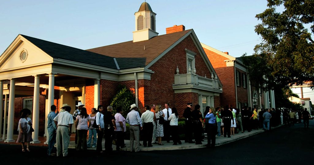 Porter Loring Mortuaries Funeral Gathering - Long Line or Mourners Wrap Around the Facility.